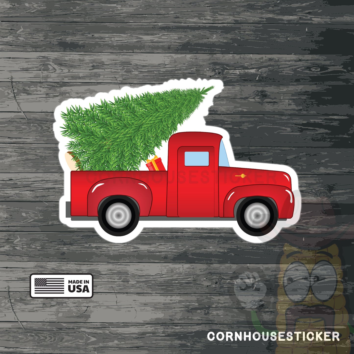 Little red truck hauling a Christmas tree